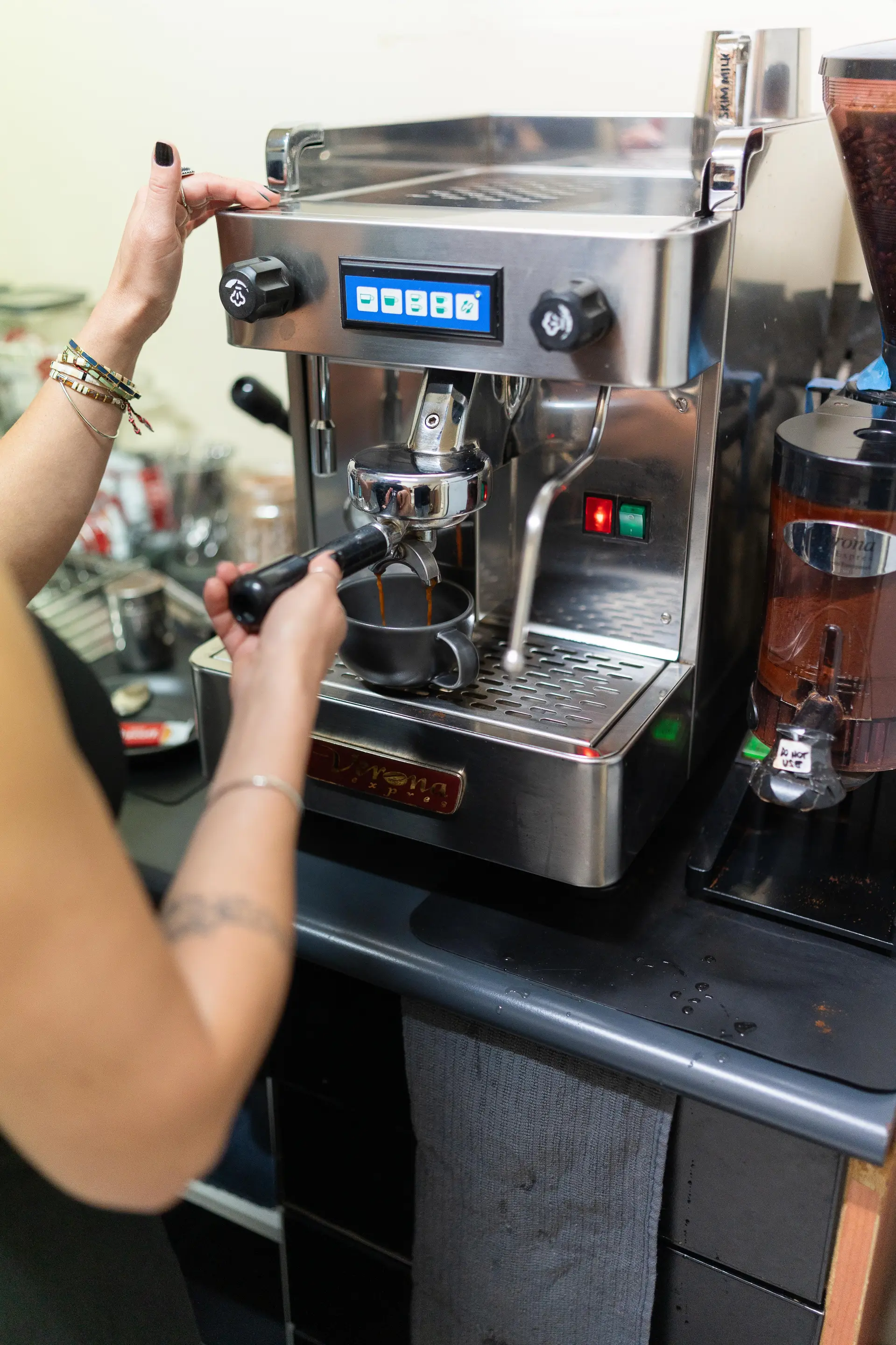 A coffee being made on the espresso machine at Cello Hairdressers.